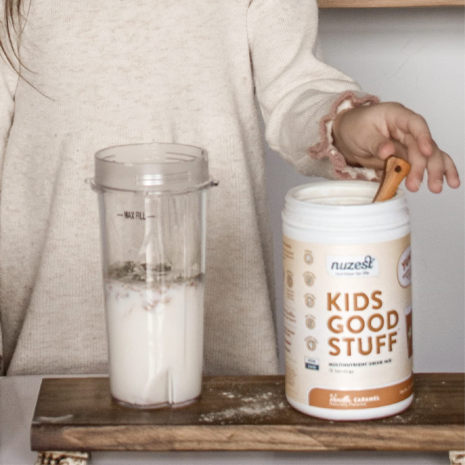 Nuzest Kids Good Stuff dairy-free badge indicates allergen-conscious choice.