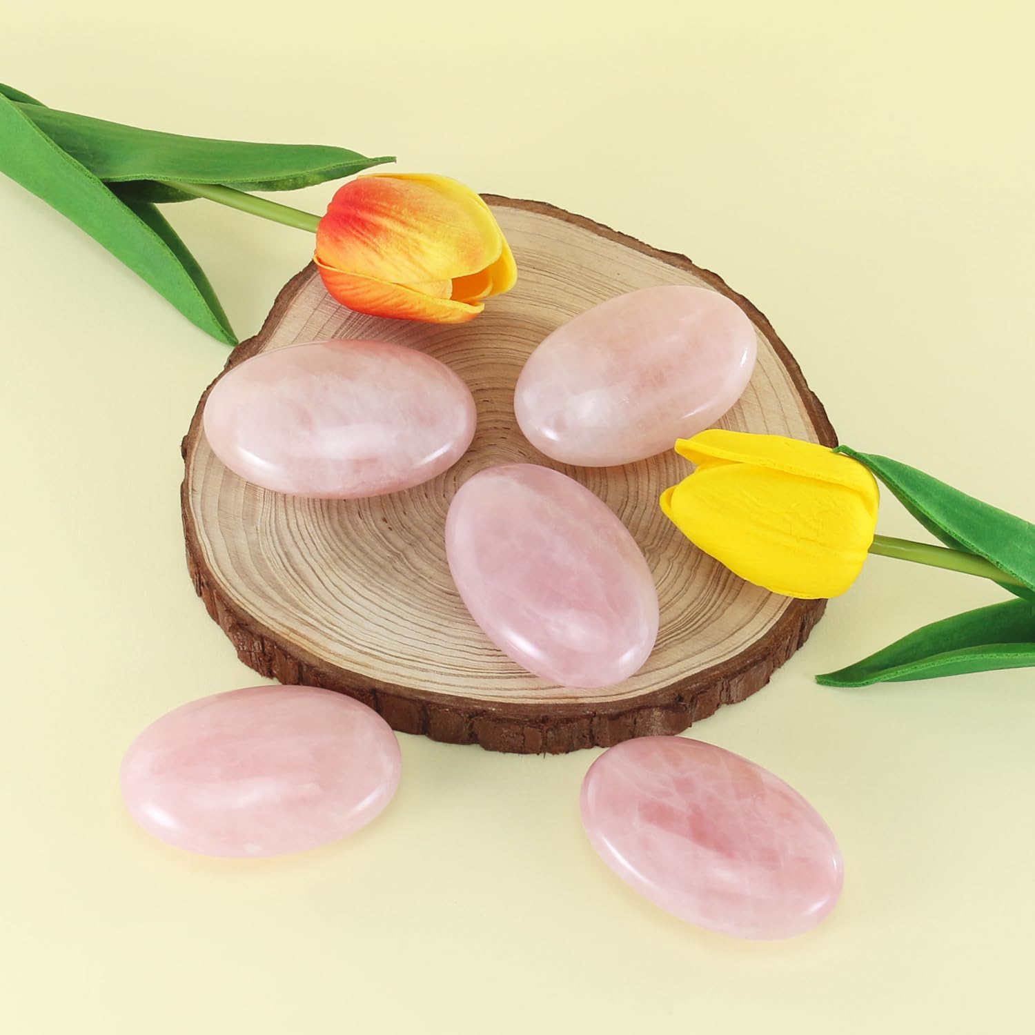 Nvzi polished rose quartz stone highlighting a smooth, reflective surface
