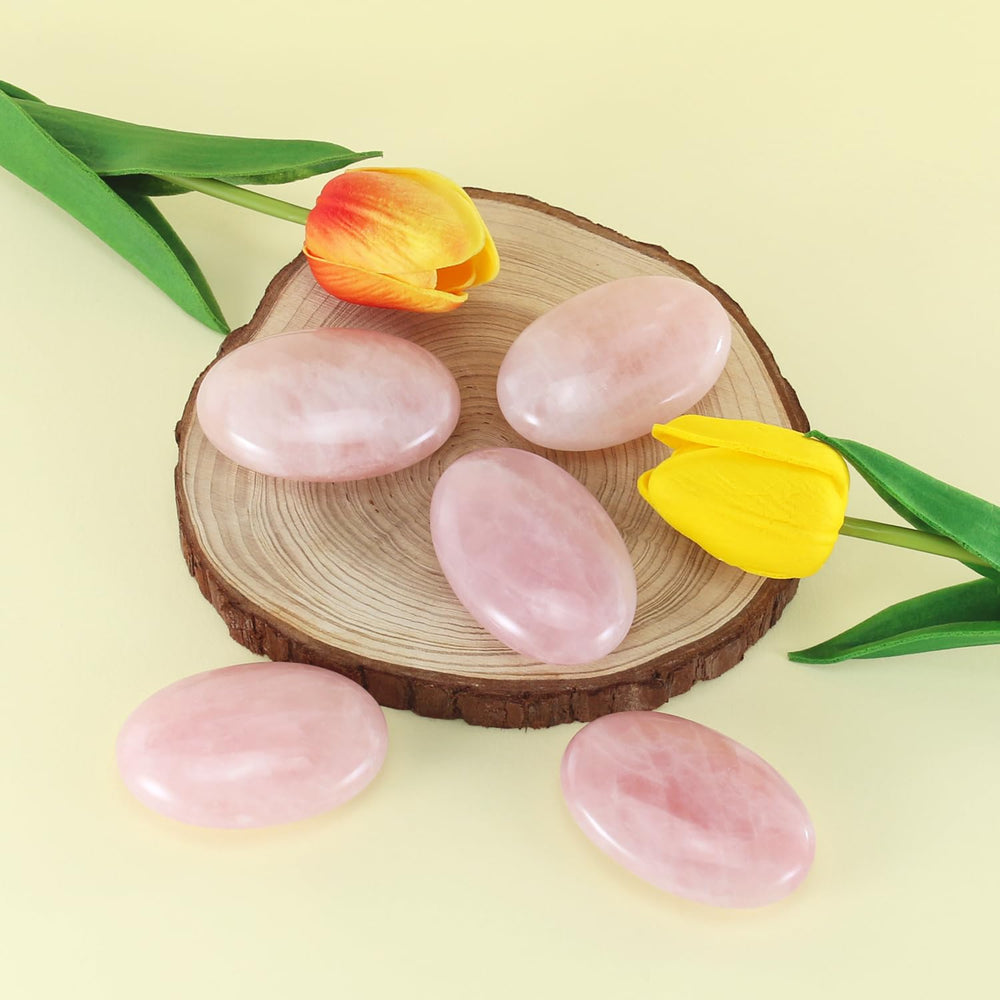 Nvzi polished rose quartz stone highlighting a smooth, reflective surface