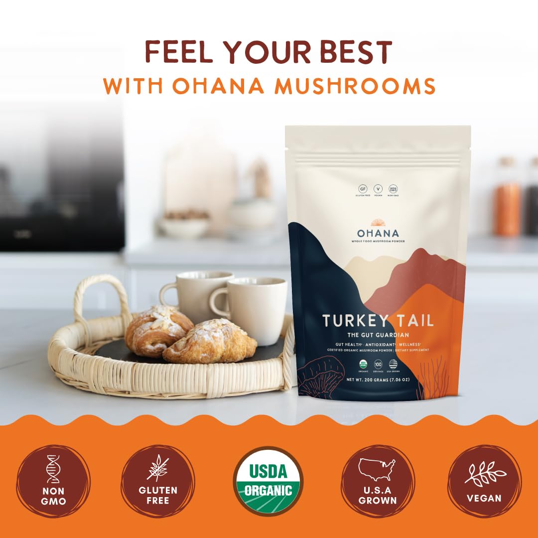 Pouring Ohana Turkey Tail powder into a cup for a warm beverage