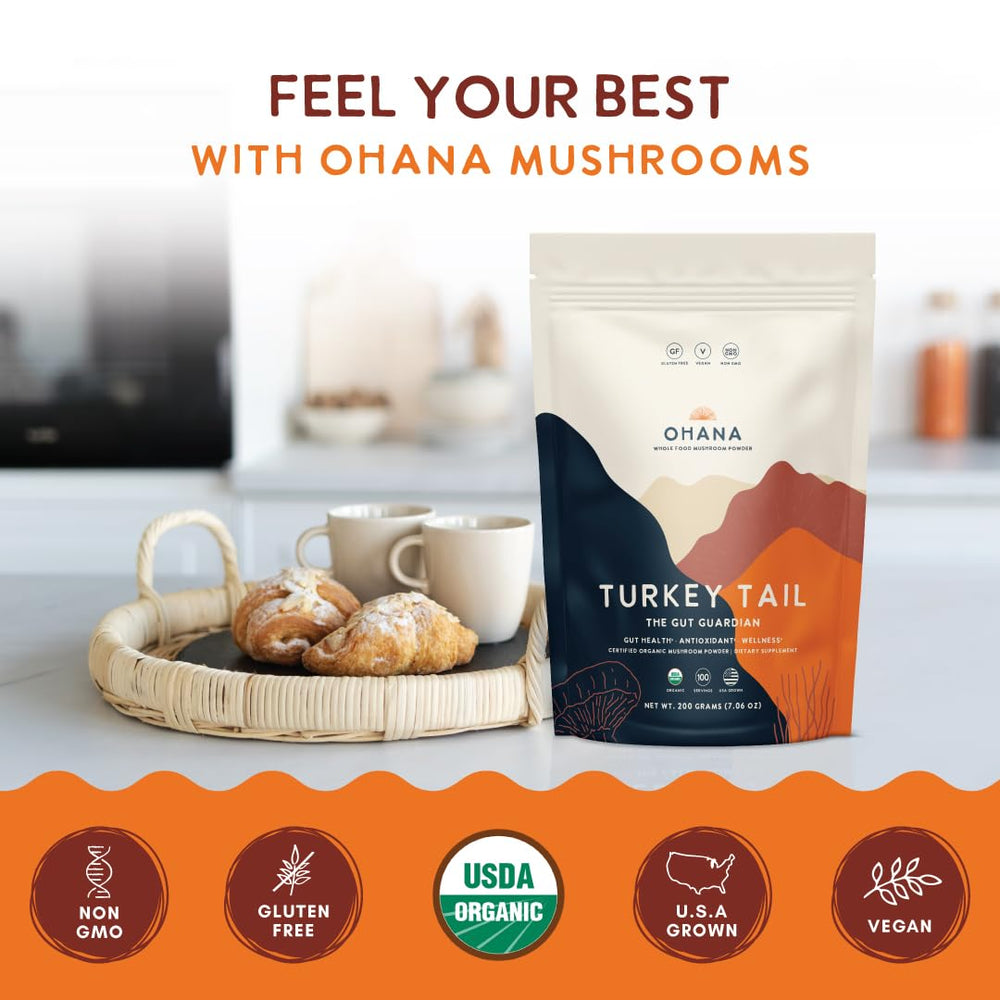 Pouring Ohana Turkey Tail powder into a cup for a warm beverage