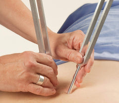Ohm Therapeutics cranial-sacral applications for tension release and calm muscles.