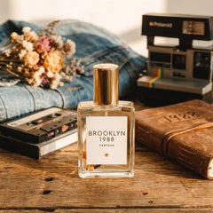 Olivine Atelier Brooklyn 1988 amber-blanc note detail highlights warm depth.