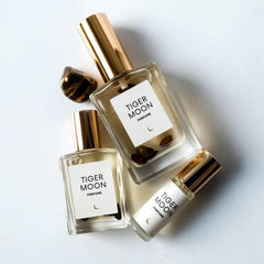 Olivine Atelier Tiger Moon amber jar on vanity for daily rituals.