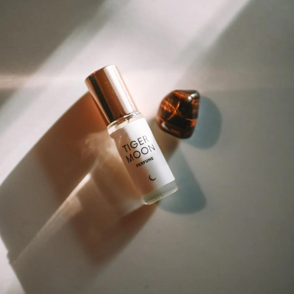 Olivine Atelier Tiger Moon in-hand application for instant mood lift.
