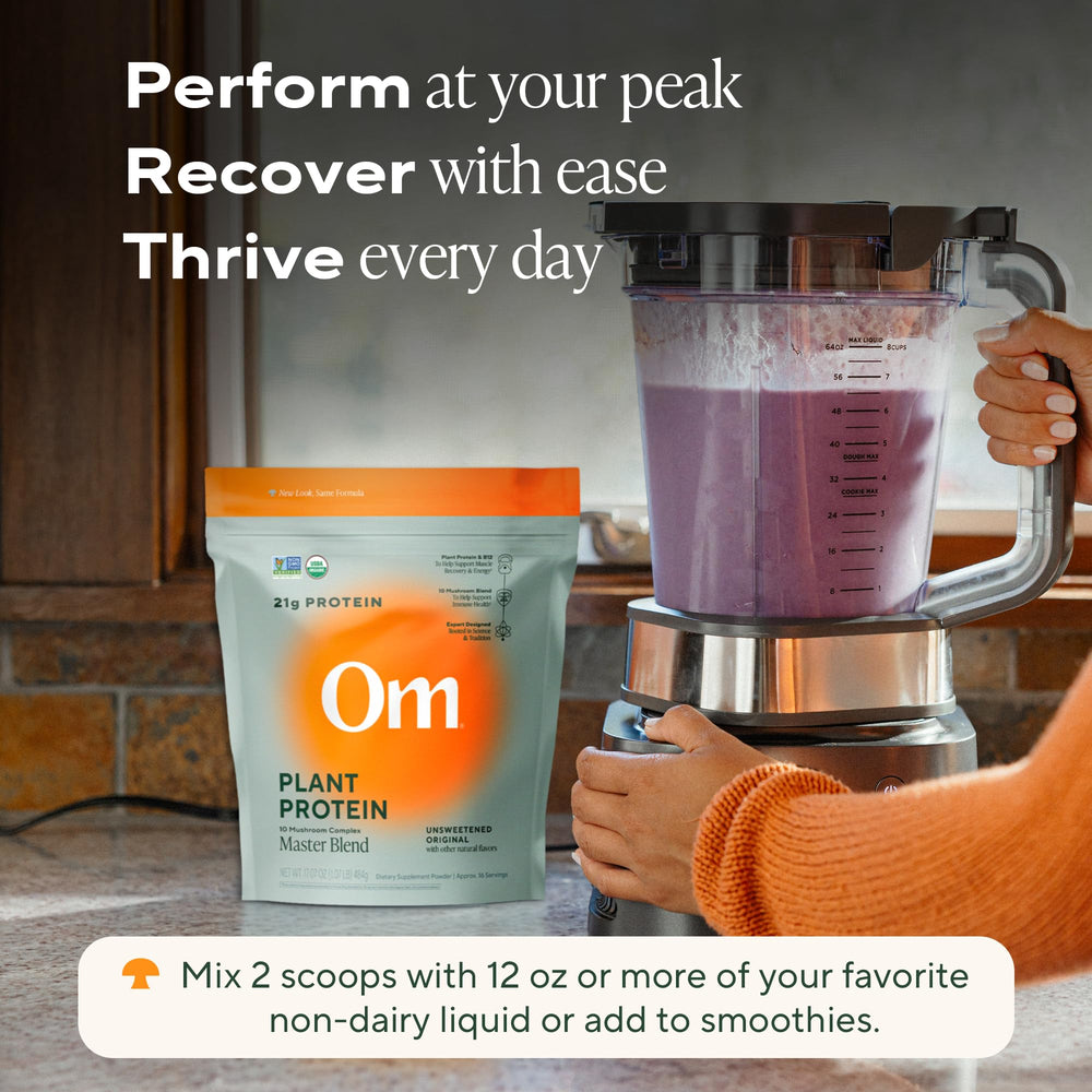 OM Master Blend drink pours into glass for a balanced protein-rich sip.