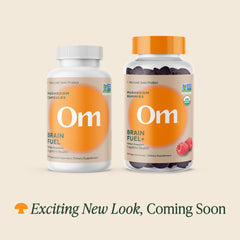 Close-up of OM Brain Fuel capsules emphasizing convenience