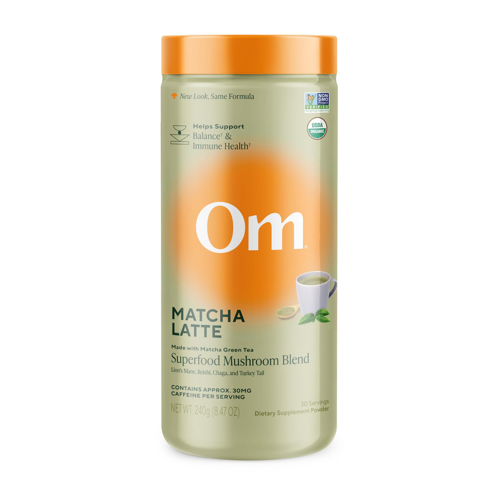 OM MUSHROOM SUPERFOOD Matcha Latte canister front highlights focus ingredients.