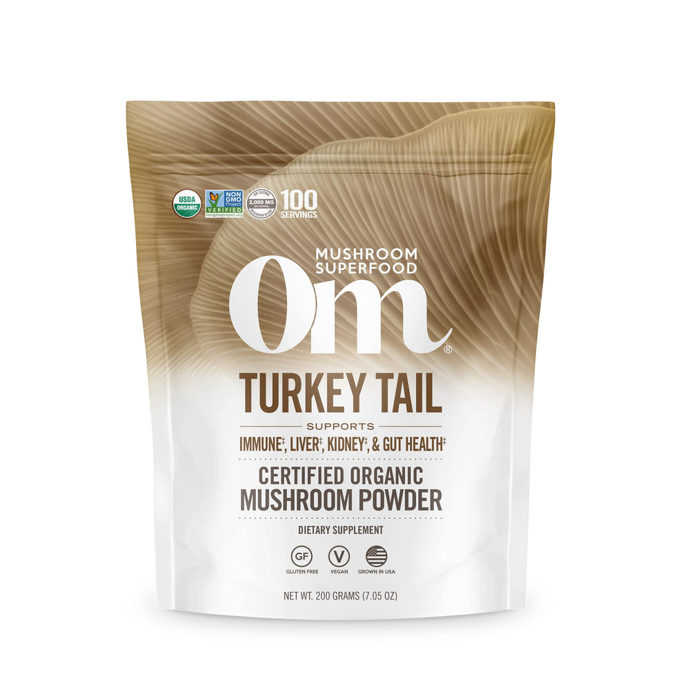 Om Mushroom Superfood turkey tail powder pouch front view highlighting immune-support formula.