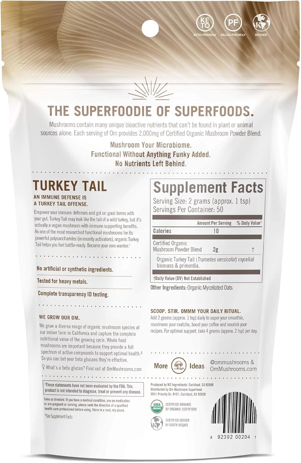 Label and bottle emphasize organic, non-GMO, vegan attributes.