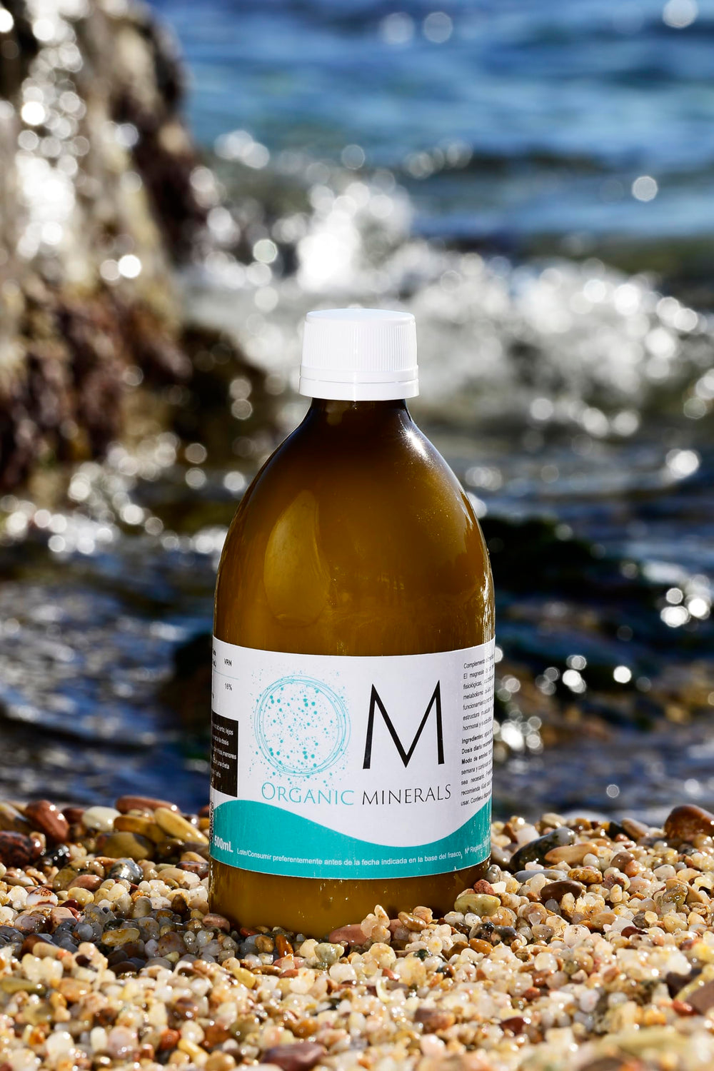 OM Organic Minerals usage in a water glass for convenient mixing.