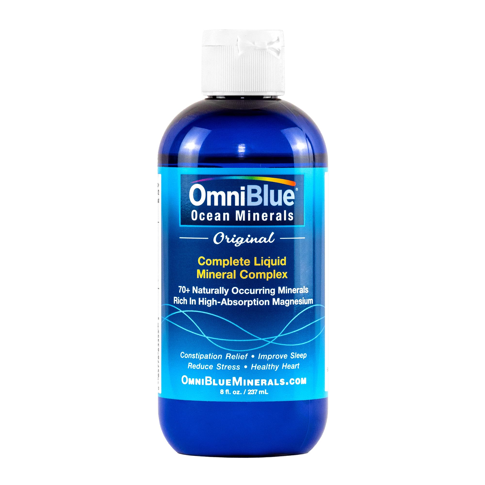 Pouring OmniBlue Ocean Minerals into water to support hydration and electrolyte balance.