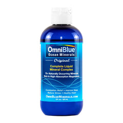 Pouring OmniBlue Ocean Minerals into water to support hydration and electrolyte balance.