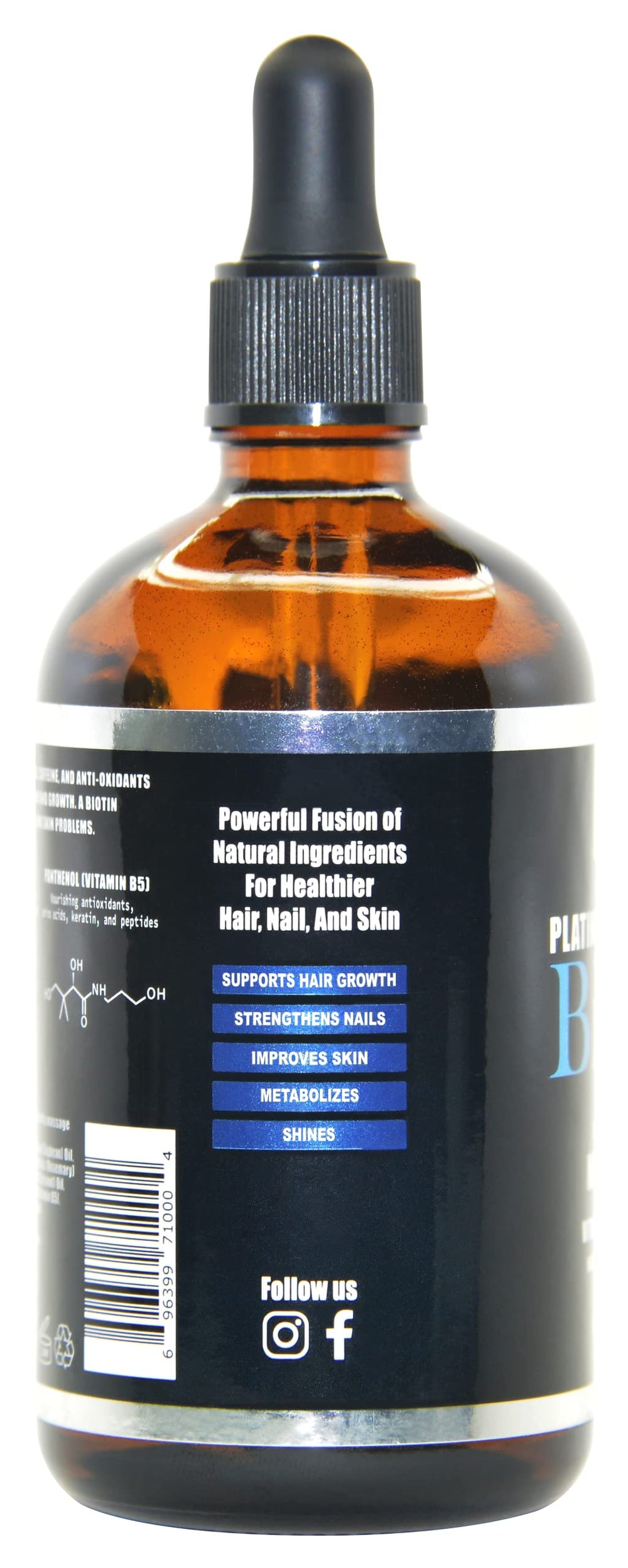 On Natural Platinum Biotin Oil label closeup highlights biotin and caffeine benefits.