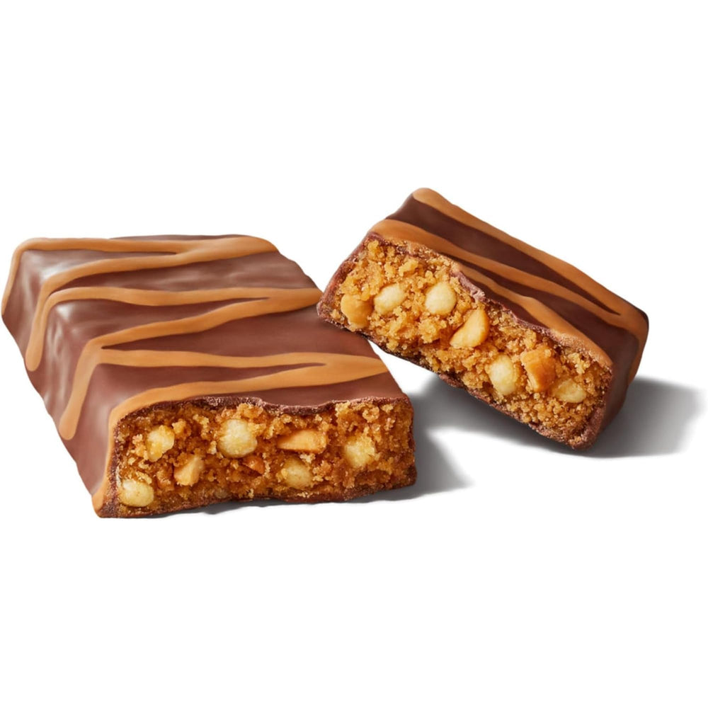 ONE Protein Bars Peanut Butter Cup bar slice, soft interior with a nutty chocolate bite