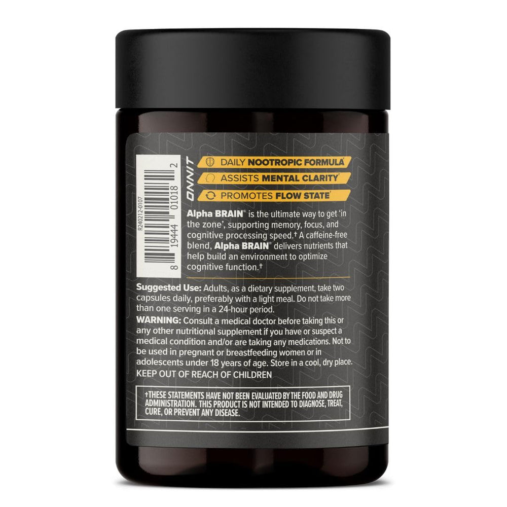 Gamer at computer with ONNIT Alpha Brain for consistent focus.