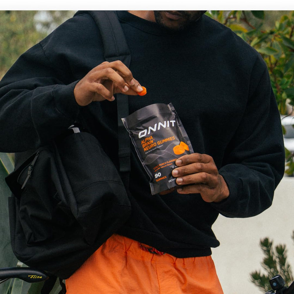 ONNIT Alpha Brain Neuro Gummies close-up shows citrus punch flavor.
