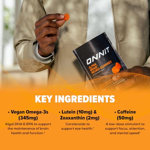 ONNIT Alpha Brain Neuro Gummies bottle on desk emphasizes vegan, non-GMO ingredients.
