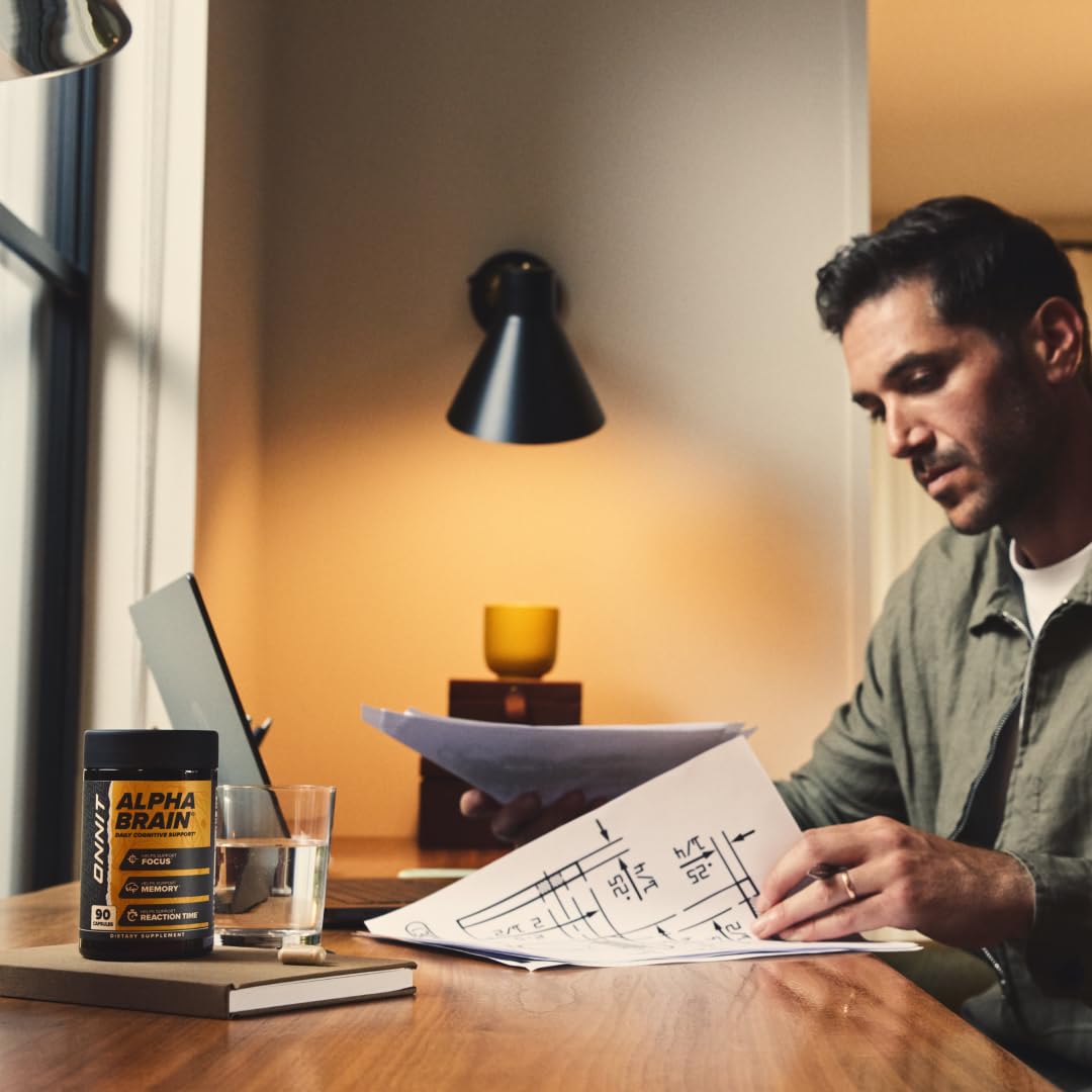 Professional in meeting with ONNIT Alpha Brain for calm concentration.
