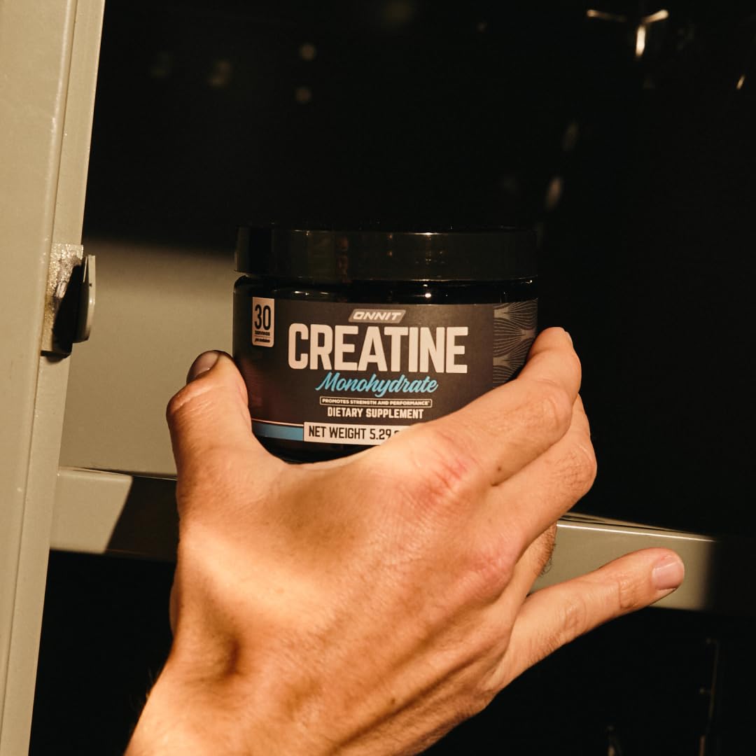 Measuring scoop with ONNIT Creatine Monohydrate Powder ready to use