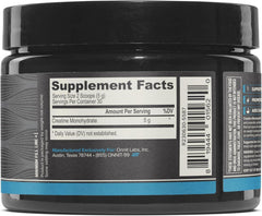 Scoop of ONNIT Creatine Monohydrate Powder ready for precise dosing
