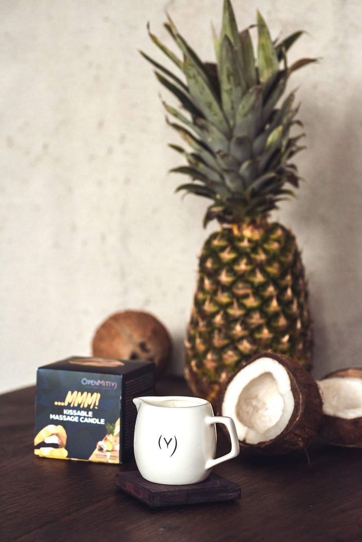 OpenMity Kissable Massage Oil Candle with shea butter nourishes skin during massage