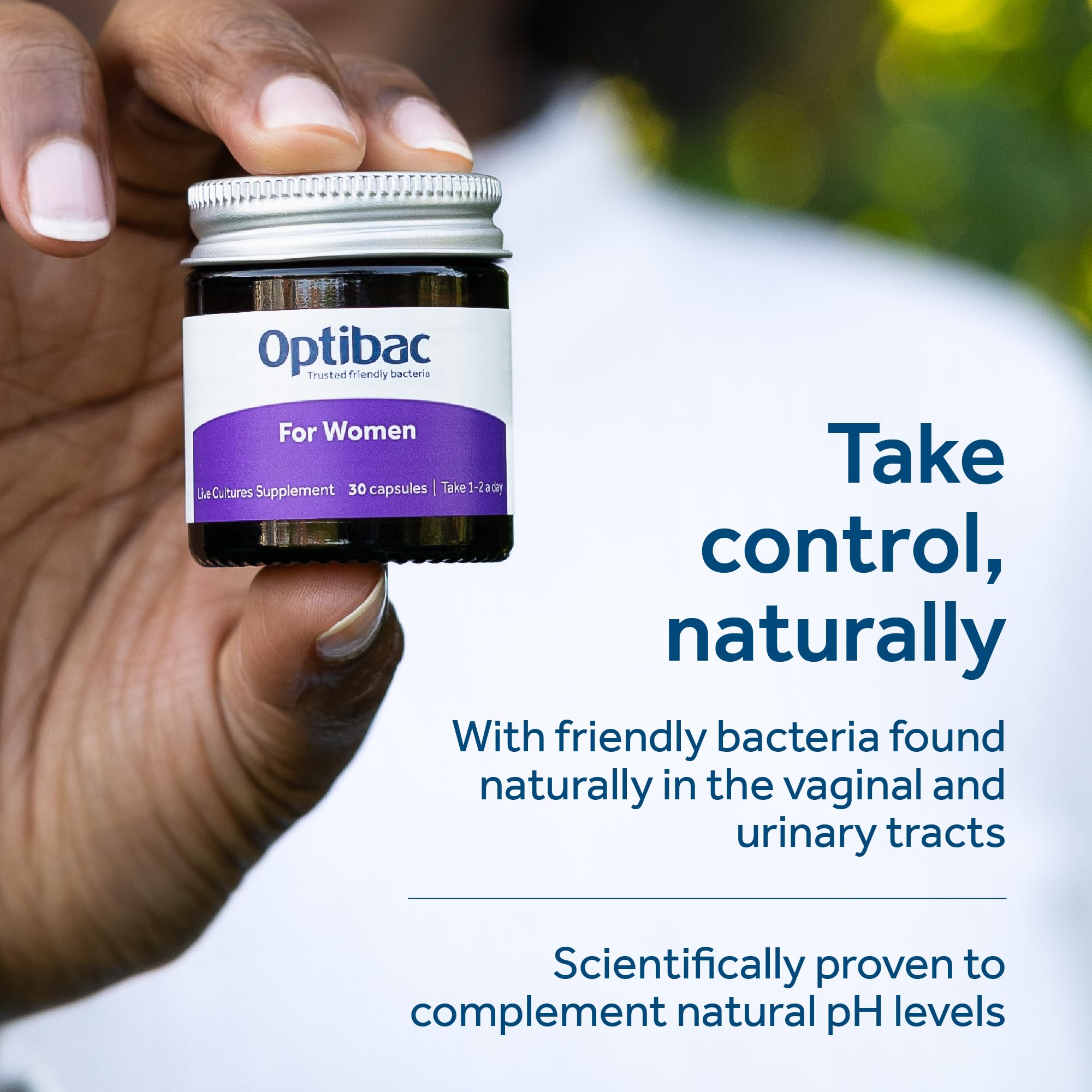 OptiBac For Women capsules in hand suggesting easy daily intake