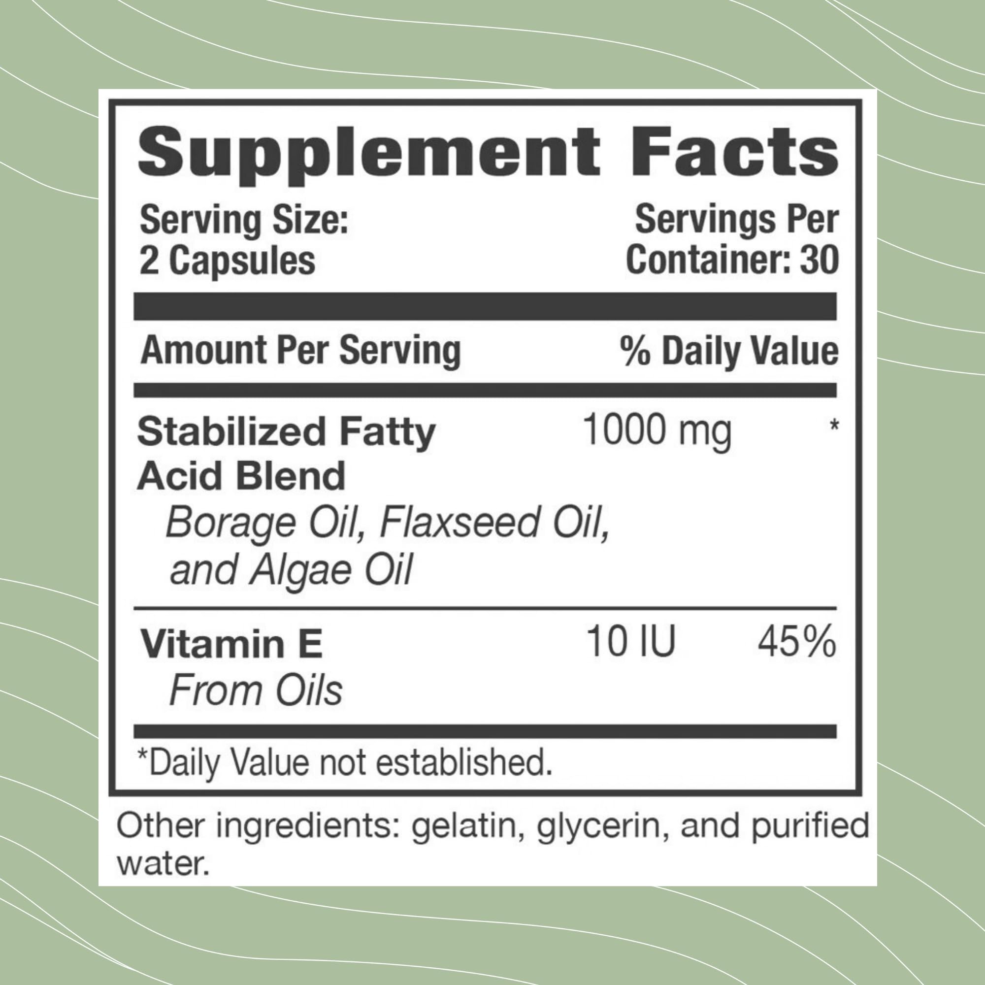 Optimal Health Systems EFA capsules on spoon for easy daily intake