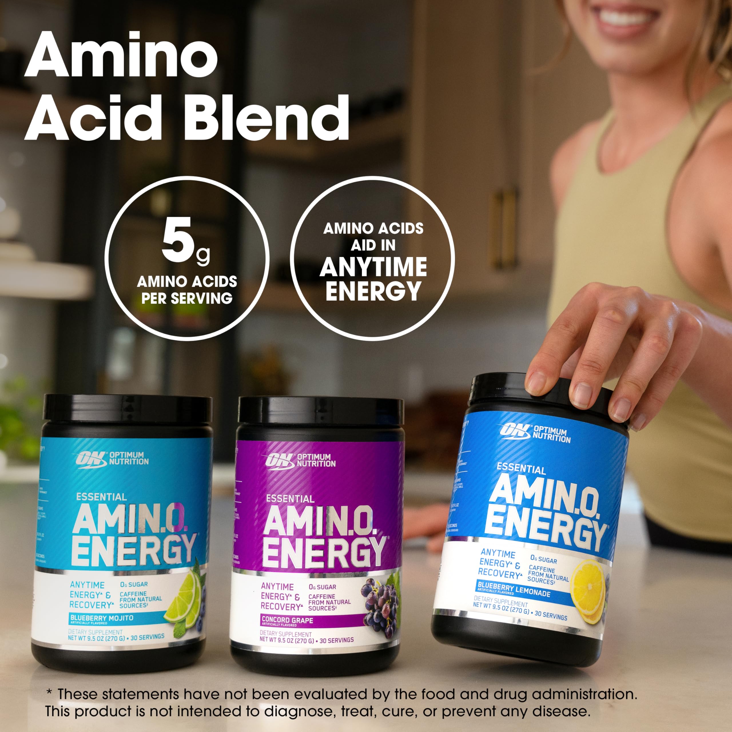 Optimum Nutrition Amino Energy glass with drink showing vibrant concord grape flavor.