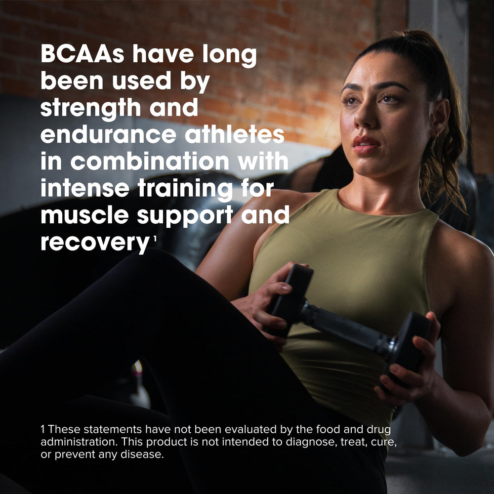 Optimum Nutrition BCAA 5000 in a shaker cup post workout scenario.