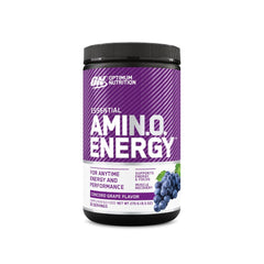 Fruit Fusion powder in a scoop next to a shaker for pre-workout mix