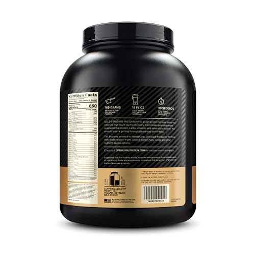 Optimum Nutrition shake poured from a shaker into a glass showing creamy texture