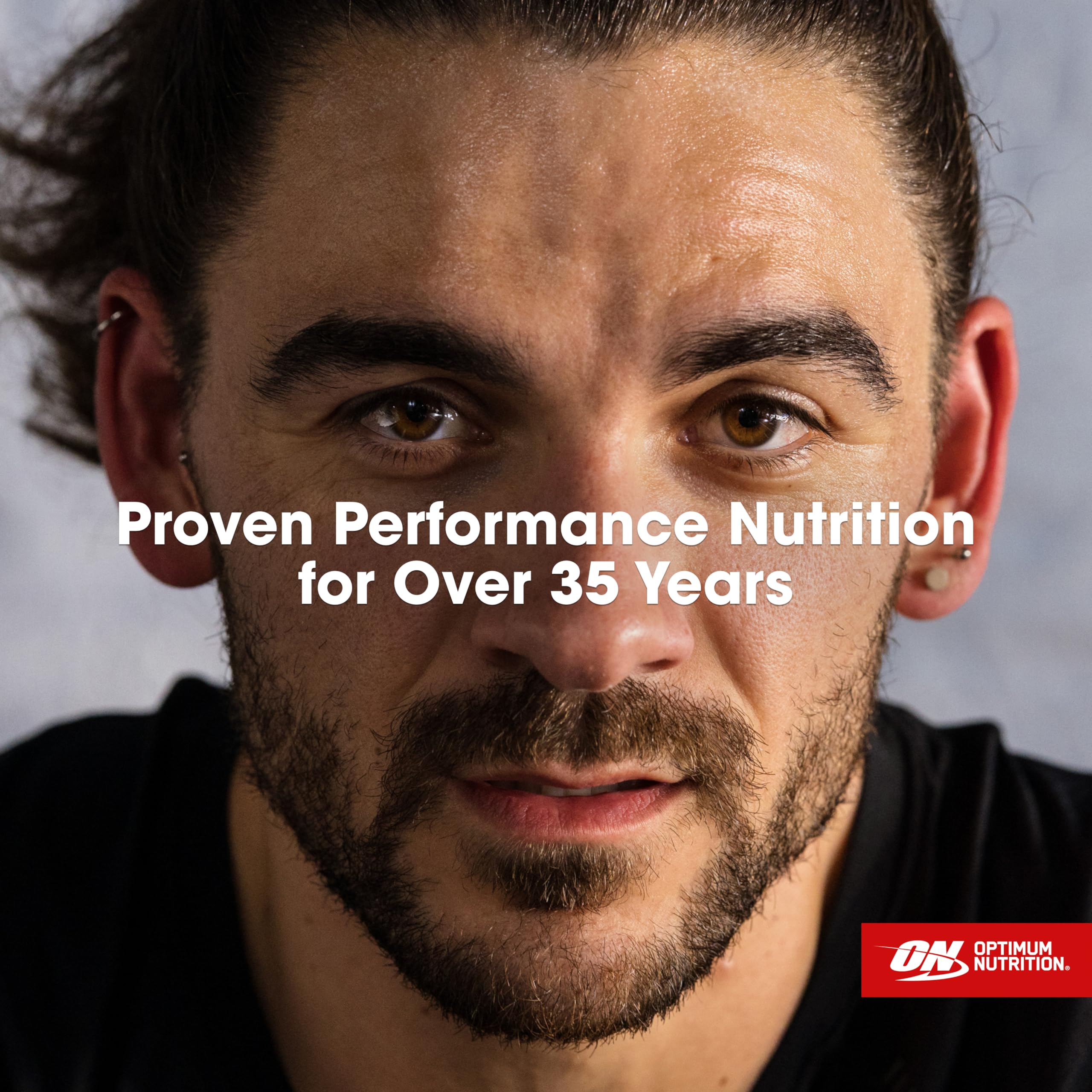 Optimum Nutrition Gold Standard whey bottle with mixer illustrating versatility