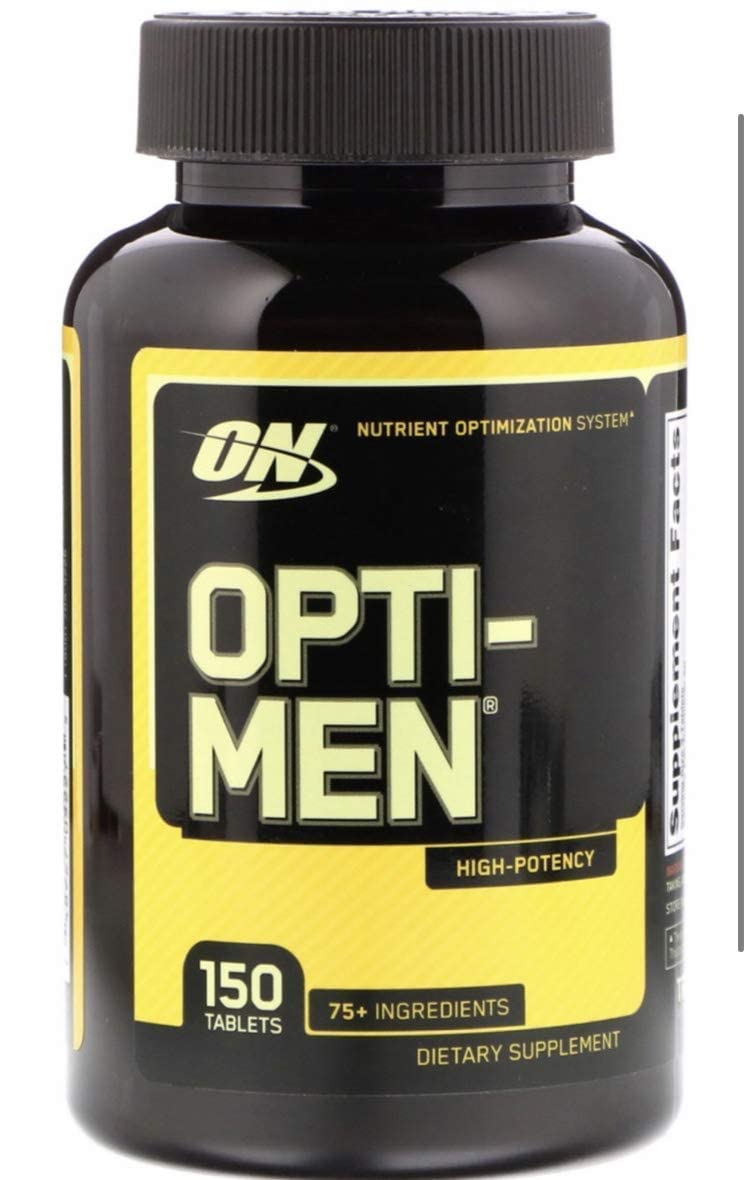 Opti-Men bottle on a nightstand ready for daily routine.