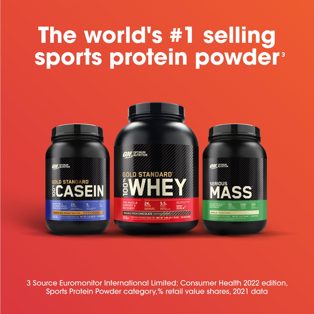 Optimum Nutrition Serious Mass strawberry powder with spoon ready to measure.