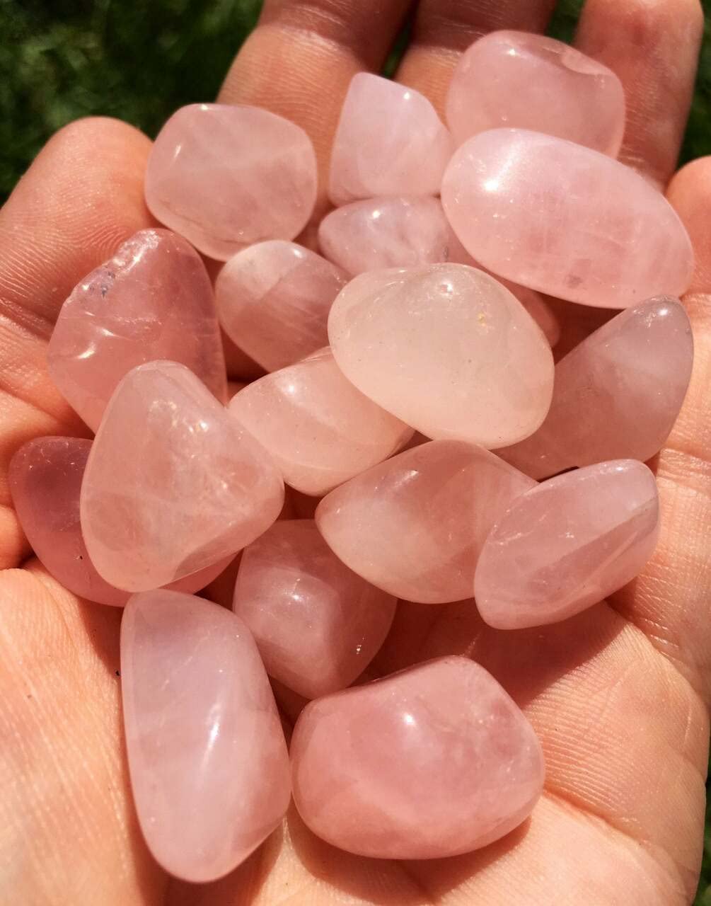 Opulent Crystals rose quartz polished stones close-up ideal for meditation and heart chakra work.