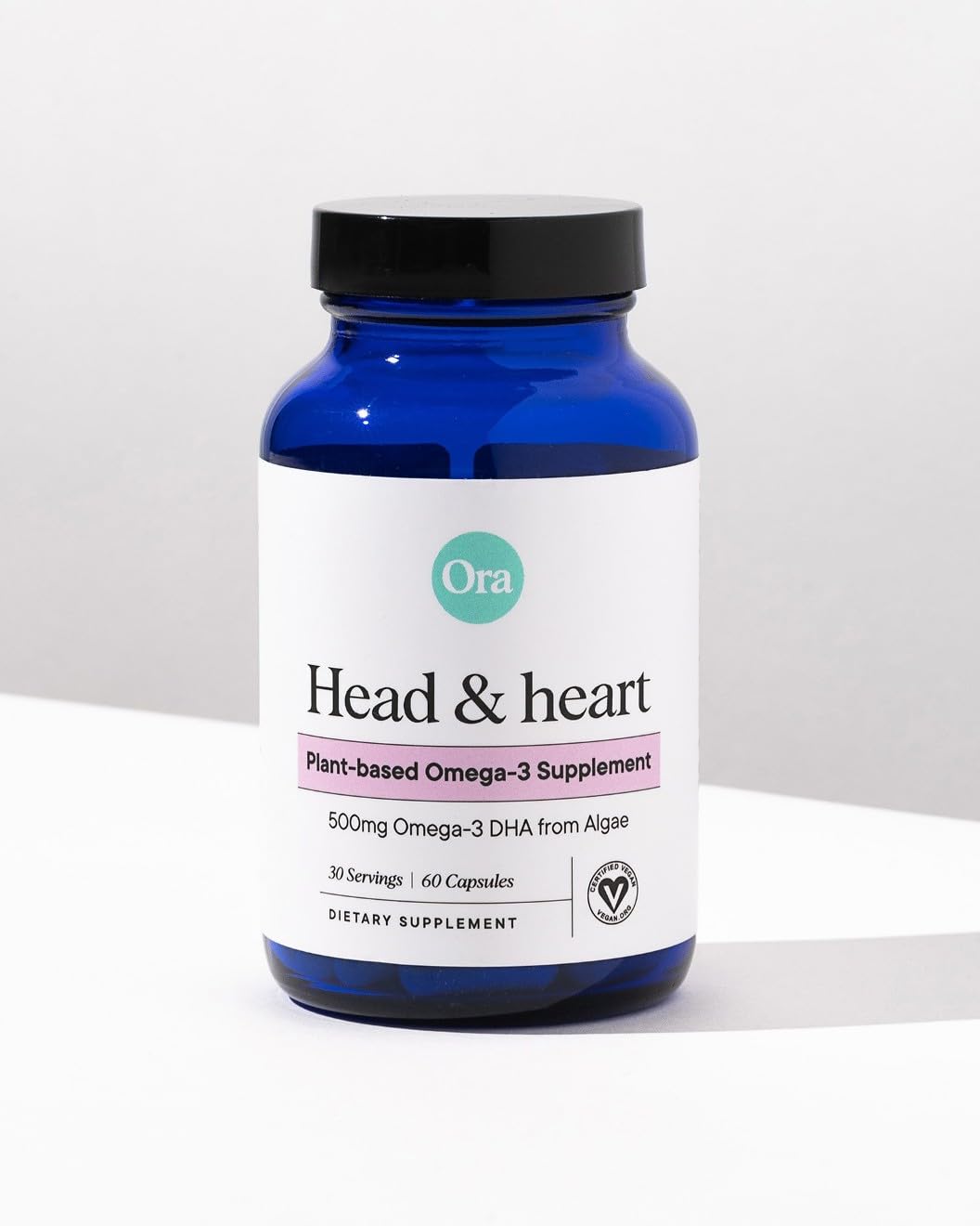 Ora Organic vegan omega3 in hand: supports daily cognitive focus.