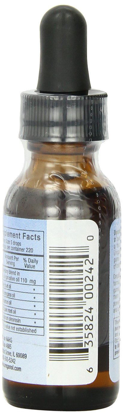 OregaDENT teeth and gums health close-up showing herbal blend for mouth wellness.