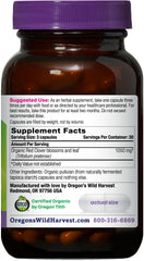 Oregon's Wild Harvest red clover bottle cap close-up, non-GMO and organic ingredients