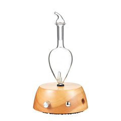 Organic Aromas Elegance diffuser setup with glass nebulizer and lightwood base