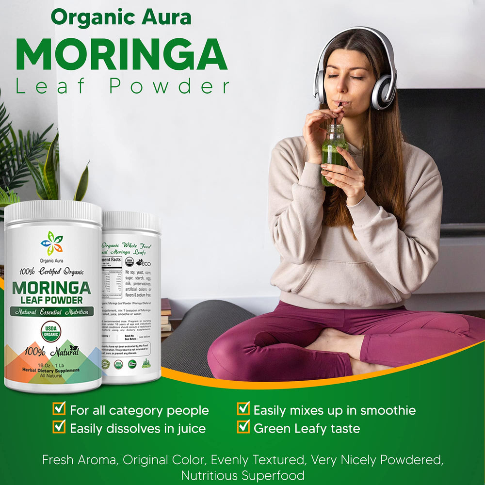 Organic Aura Moringa Powder on a kitchen counter with a scoop for easy daily nutrition