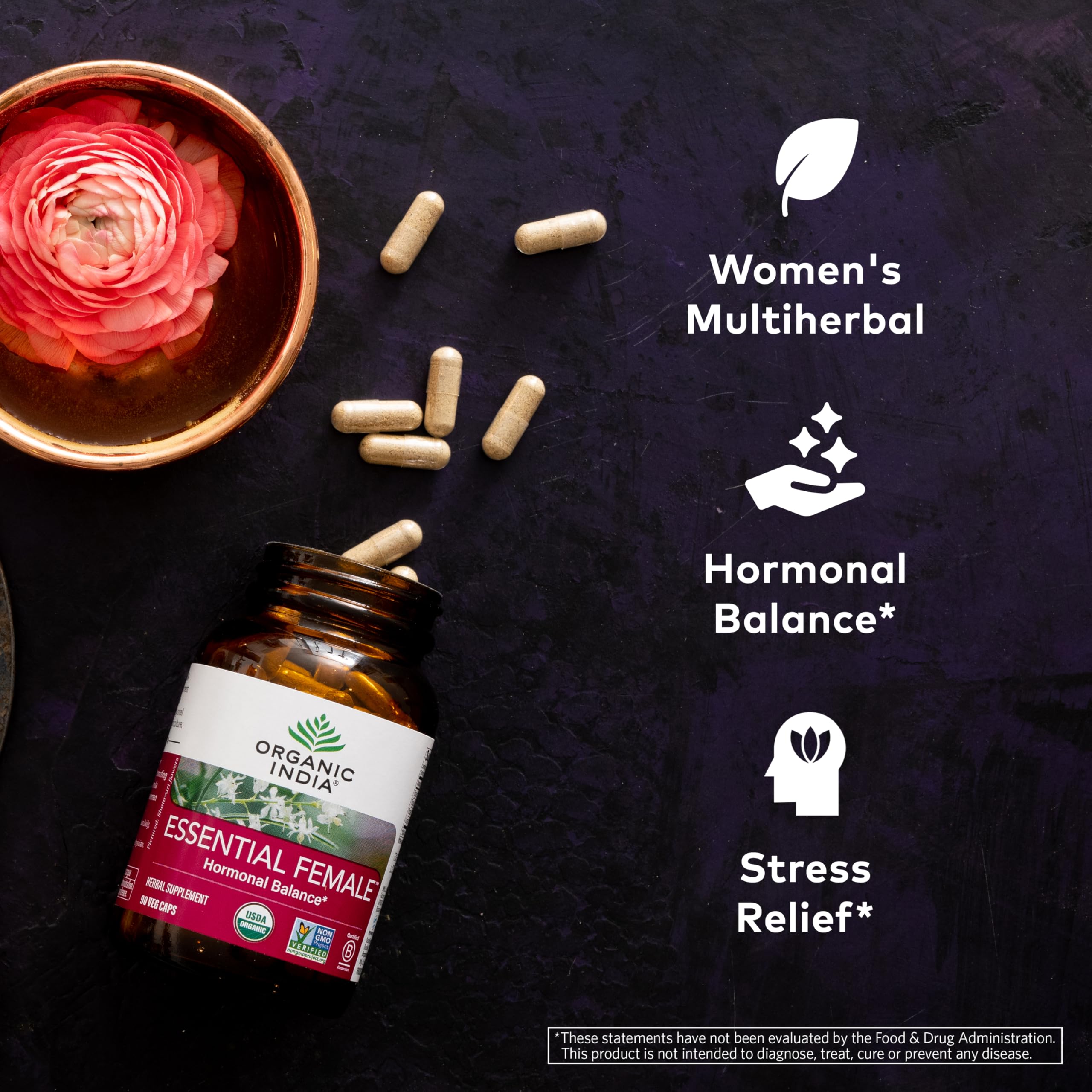 Organic India Essential Female capsules close-up for daily reproductive wellness.