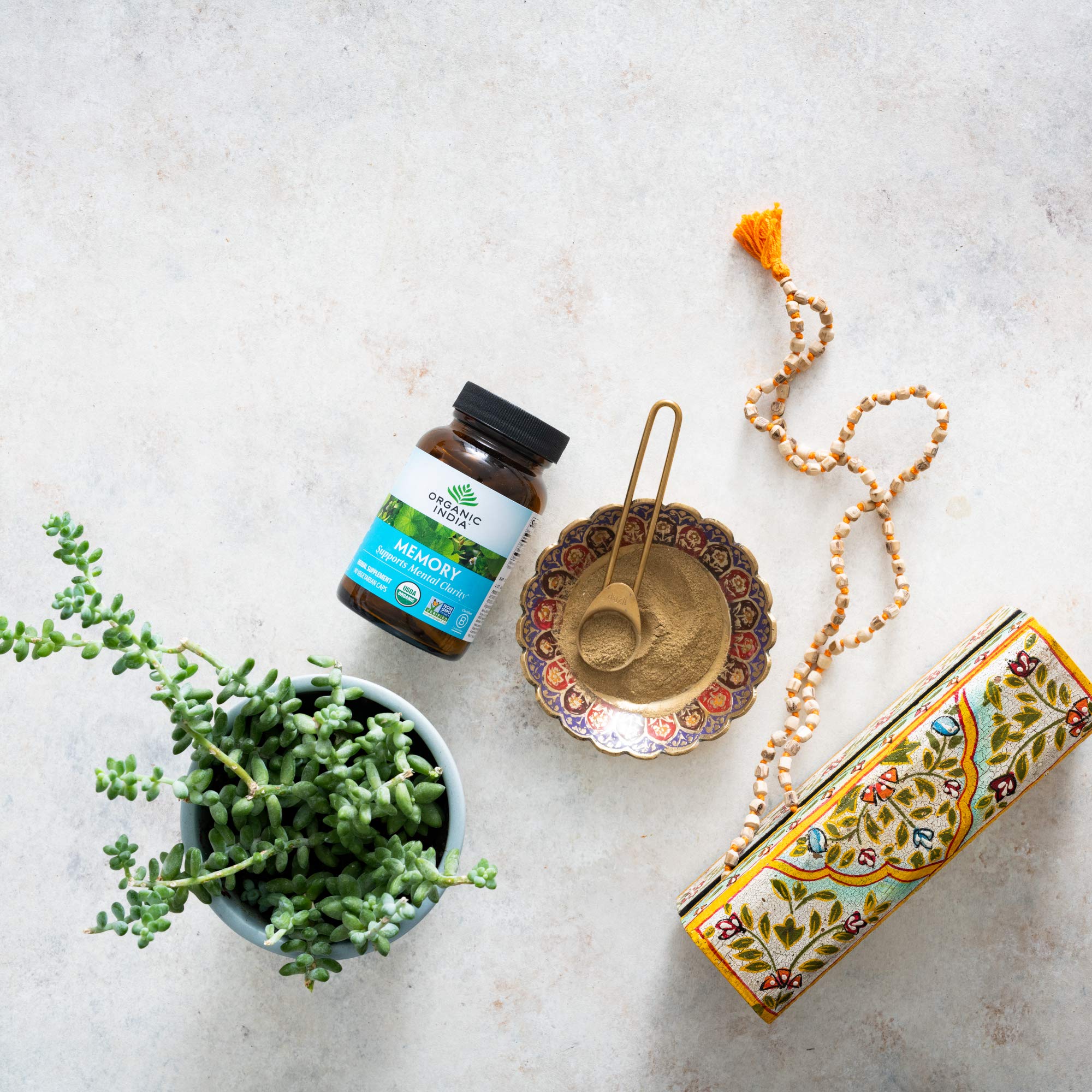 Organic India Memory bottle label front displaying ingredients and certifications for trust.