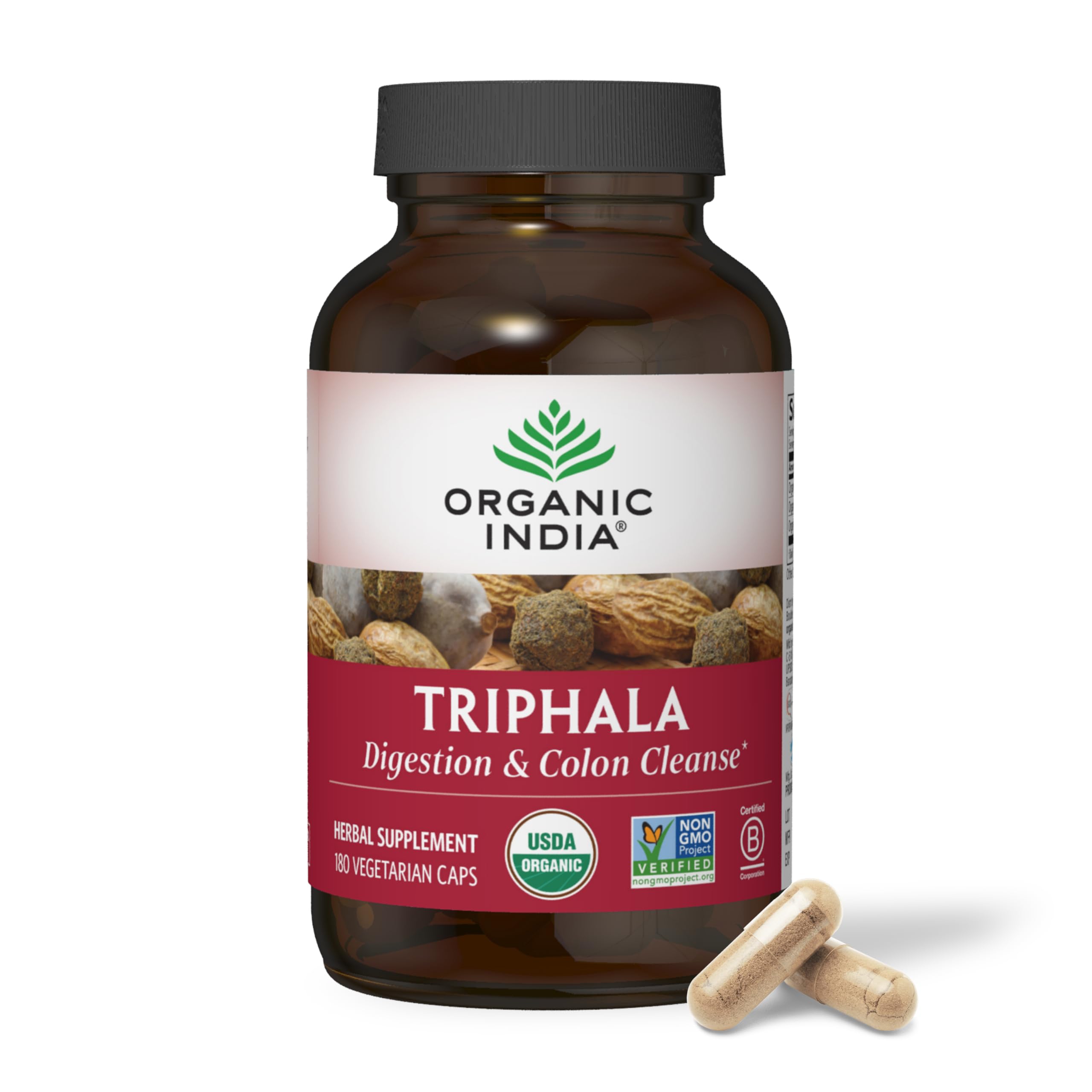 Triphala capsules in a daily routine setting for healthy digestion.