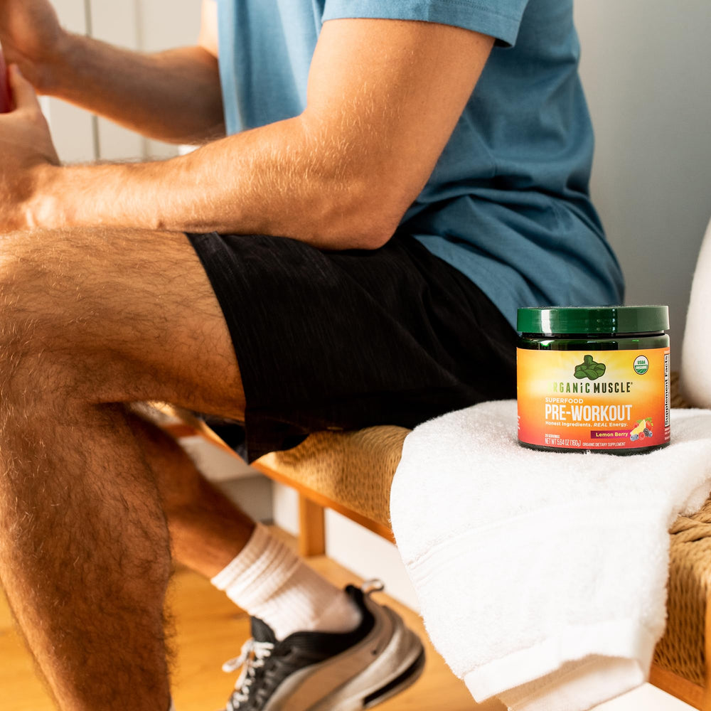 Organic Muscle packaging highlights low caffeine for jitters-free workouts.