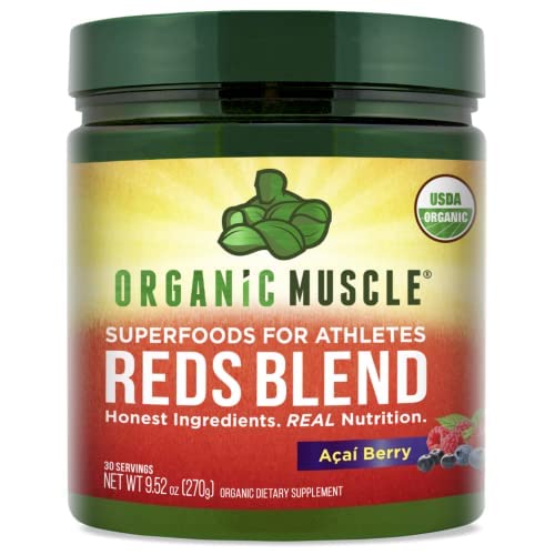 Organic Muscle Reds Powder eco-friendly packaging on a kitchen counter.