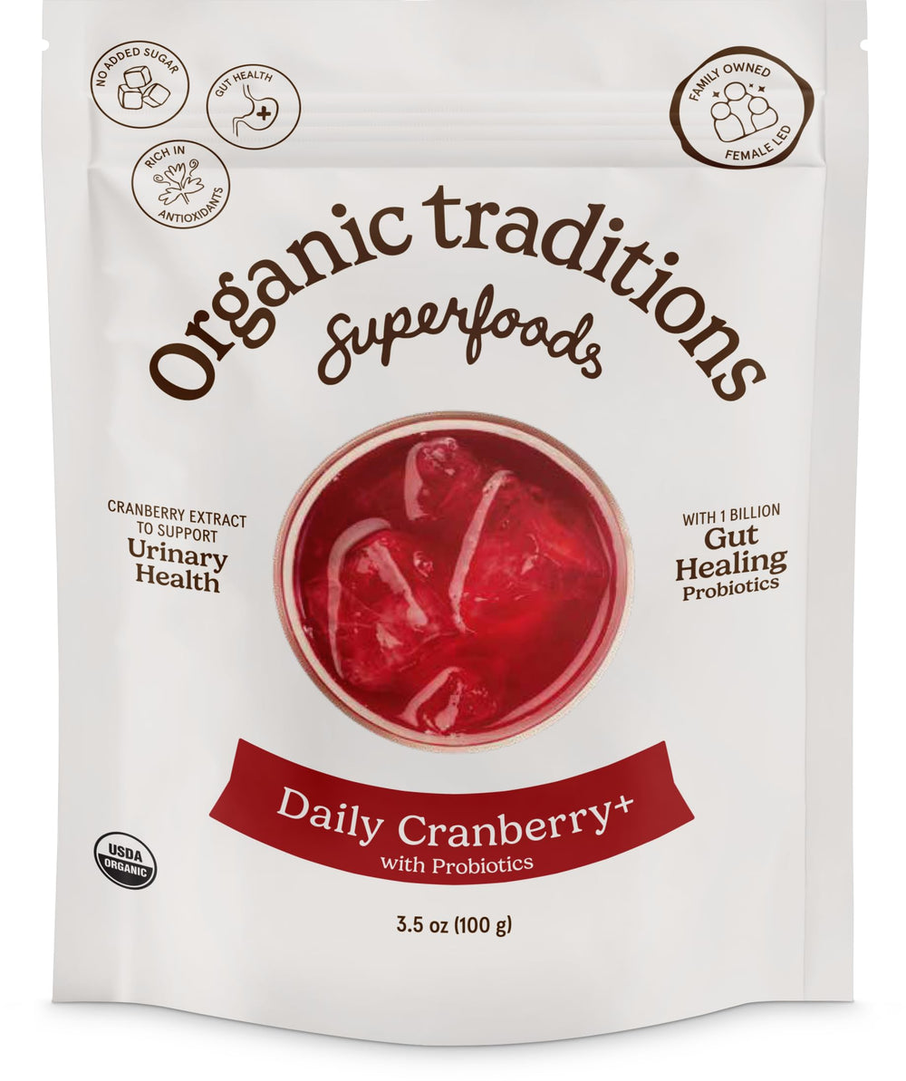 Organic Traditions Daily Cranberry+ powder bottle ready for daily use.