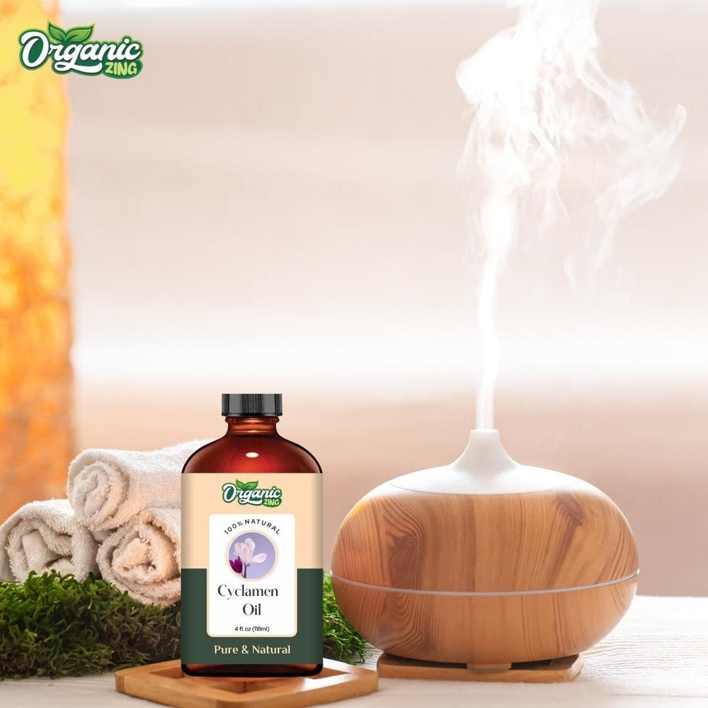 Organic Zing Cyclamen Oil packaging includes amber bottle and dropper