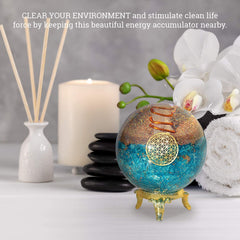 Orgonite Crystal Blue Aquamarine Ball on desk encourages mindful breathing during study.