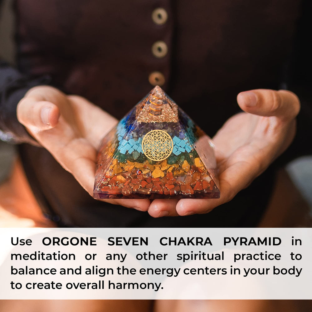 Orgonite Crystal Seven Chakra Pendant on chain demonstrates portable energy balance